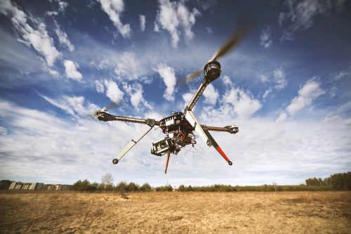 An image of a quadrocoptor drone taking flight